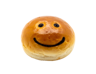 Cute smiley face baked into a golden brown bread roll