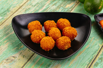 Fried crispy yellow cheese balls