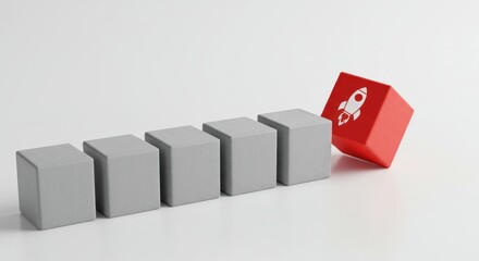 Gray cubes in a row with a red cube featuring a rocket icon.