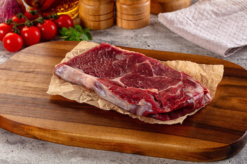 Gourmet raw rib eye steak