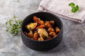 Peeled mussels heap in the bowl