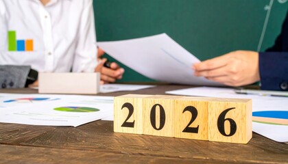 Business Professionals Planning for 2026 with Financial Reports
