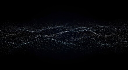 Abstract blue wave of sparkling particles floats against a black background