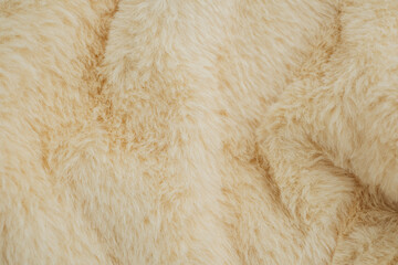 Creamy beige fur texture for pet product ads or winter fashion backgrounds