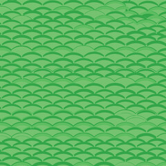 Fototapeta premium A vibrant green scalloped pattern creating a mesmerizing visual texture with subtle tonal variations.