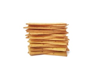Pile of square biscuits cracker isolated on white background 