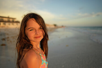 Up close portrait beautiful tween girl on tropical beach Anna Ma