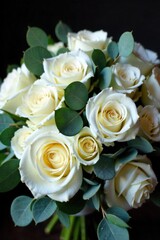 Obraz premium Delicate Wedding Bouquet with Dewdrops and Ribbons A lush bridal bouquet of white roses, blush peonies, and eucalyptus leaves, tied with a flowing ivory silk ribbon. Dewdrops glisten on the petals and