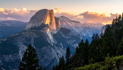 Majestic mountain vista illuminated by golden hour sunlight