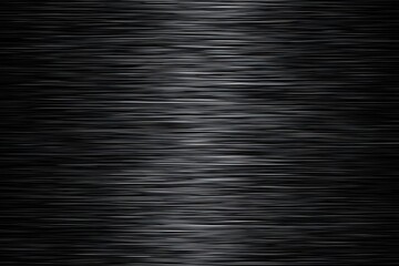 Smooth Black Metallic Texture with Subtle Light Reflection for Background and Design Use