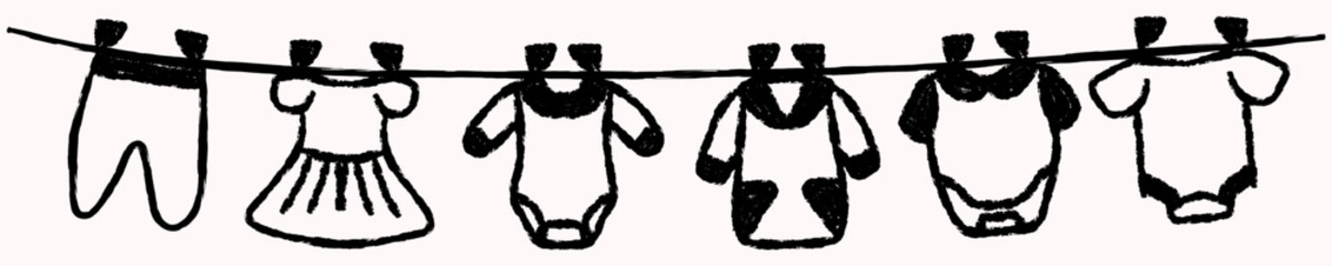 Cute hand drawn crayon doodle style baby clothes drying on rope