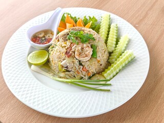 Delicious and fried rice seafood dish on a plate for a healthy lunch or dinner meal