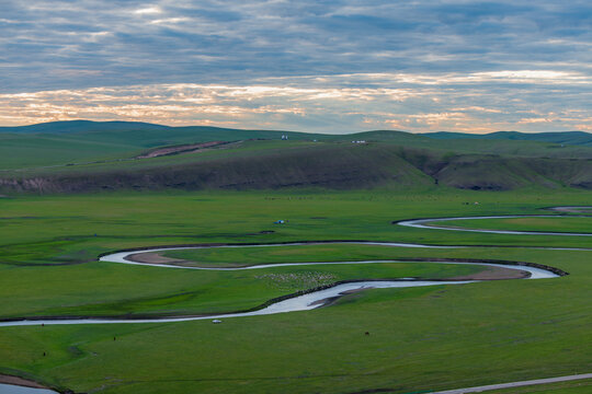 The sunset view in the Mergel River Valley of the Hulun Buir Grassland in Inner Mongolia Autonomous Region, China