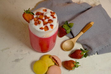 top view of strawberry slices on whipped cream