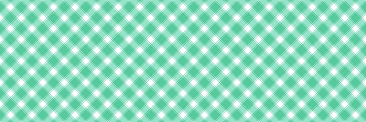 Fototapeta premium Green argyle gingham pattern background. Perfect for textiles, digital paper, and various design projects. The classic checkered plaid design adds a touch of vintage charm.