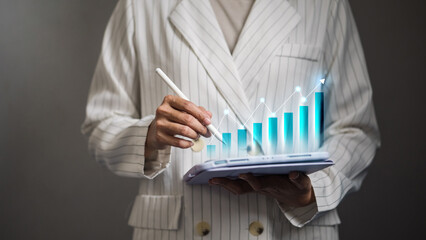 Business analytics growth concept, woman using digital tablet with data chart and stylus pen