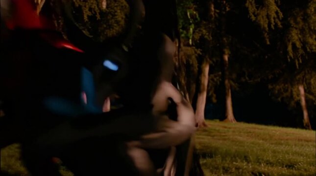 Occult. Demonic horny creatures in capes from other world frantically run out the forest. Otherworldliness