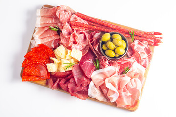Charcuterie board. Antipasti appetizers of meat and cheese platter with salami, prosciutto crudo or jamon and olives