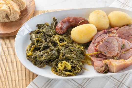 Galician lac&oacute;n con grelos dish with chorizo and potatoes