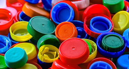 Different sorts of colorful plastic bottle caps. Recycling
