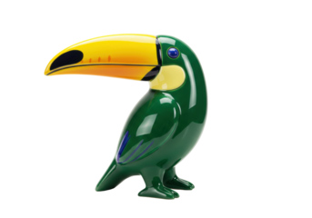 Isolated Toucan figurine with bright yellow beak is posed in a standing position on feet