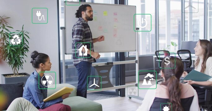 Presenting man pointing at whiteboard in meeting room, with floating energy icons and sticky notes - Powered by Adobe