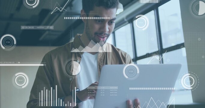 Holding laptop, tech professional analyzing floating data overlays inside office, visualization