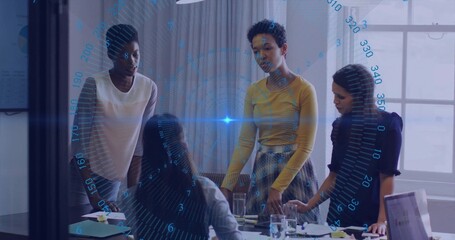 Four businesswomen analyzing holographic data overlay and documents in meeting room, with laptop