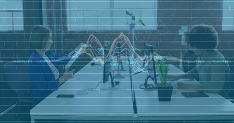 Woman in blazer and man in sweater collaborating in modern office with clipboard, graph overlay