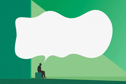 Man sitting alone indoors with large speech bubble and green background