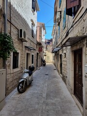A narrow street in an old Croatian town