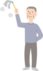 はたきで掃除をするシニア男性