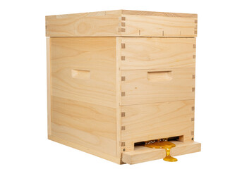 Isolated wooden beehive box with honey dripping at the entrance to the hive structure