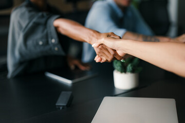 Modern, inclusive, and collaborative atmosphere in the office. They warmly welcome the new colleague