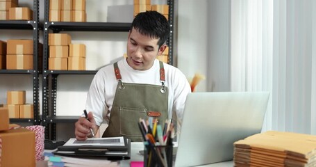 A hardworking man managing inventory and shipping in his online store, reflecting dedication, logistics control, and the essential role of technology in modern e-commerce operations. - Powered by Adobe