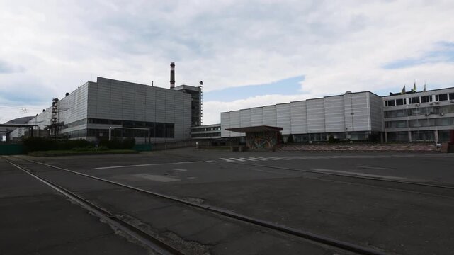 Buildings Within The Grounds Of Chernobyl Nuclear Power Plant In Ukraine. Panning Shot