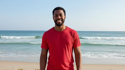 Realistic Video Man Standing on Beach Wearing Red T Shirt and Gray Shorts