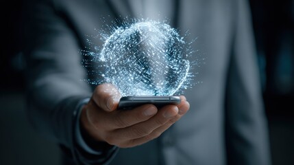 A businessman holding a smartphone projecting a digital globe, symbolizing innovation and connectivity in technology.