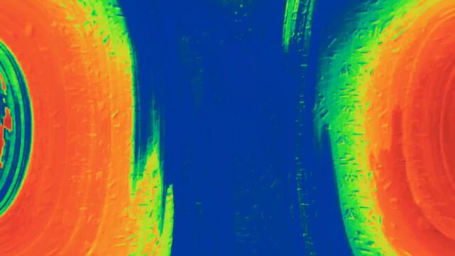 Vibrant thermal-style gradient with flowing red, green, and blue waves. Ideal for music visuals, sci-fi interfaces, or high-energy digital backgrounds.