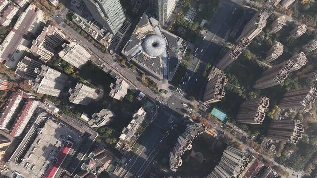 Aerial view of Shanghai's buildings and streets, where the architectural forms create a stunning contrast, Shanghai, China.