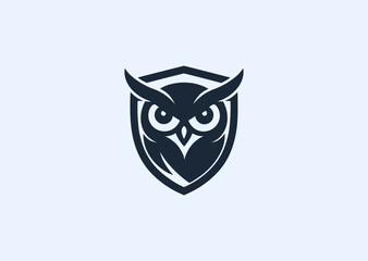 An owl shield logo representing wisdom and protection, combining strong heraldic symmetry with sleek modern style
