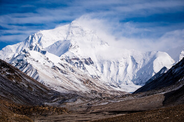 Aerial and ground views of Mount Everest from the Tibetan side. Majestic snow-covered peaks of the...