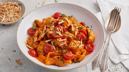 Pasta with creamy pepper sauce and rosemary