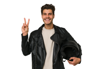 Young caucasian man holding a motrbike black helmet isolated showing number two with fingers.
