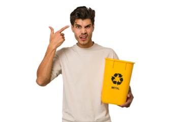 Young caucasian man holding a metal trash for recycle Young caucasian man holding recycling bins isolated on white background showing a disappointment gesture with forefinger.