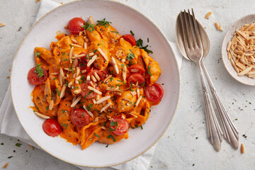 Pasta with creamy pepper sauce and rosemary
