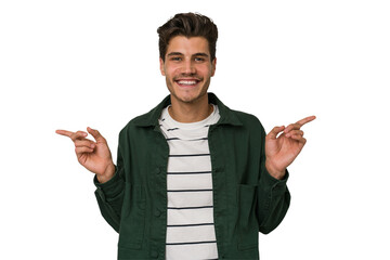 Young handsome caucasian man isolated on white background pointing to different copy spaces,...