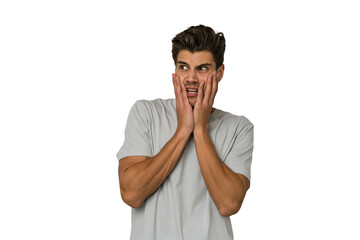 Young handsome caucasian man isolated on white background scared and afraid.