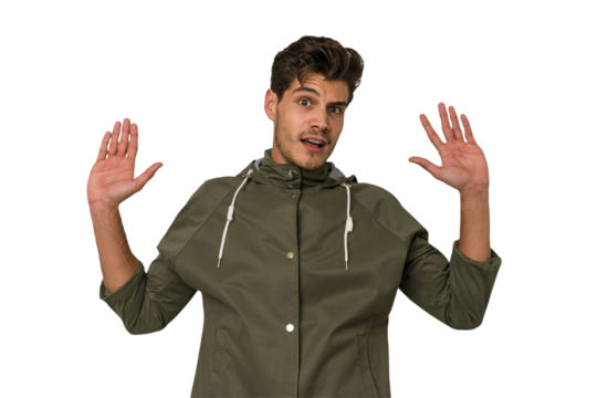 Young handsome caucasian man isolated on white background being shocked due to an imminent danger