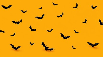 Black Bats Flying on Vibrant Orange Background for Halloween Theme